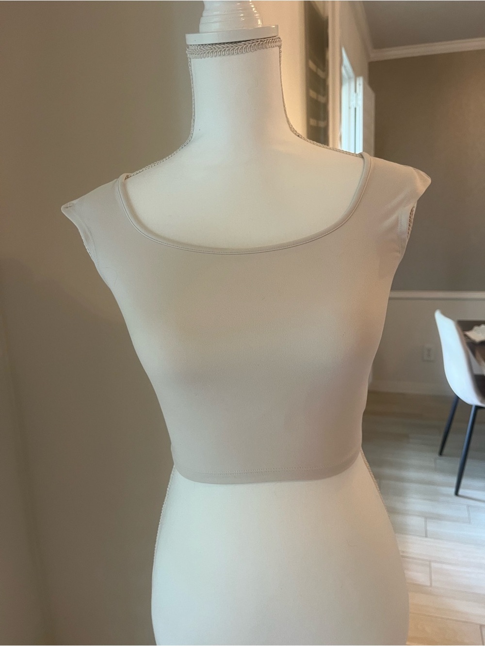 cream cropped top with cross back detail